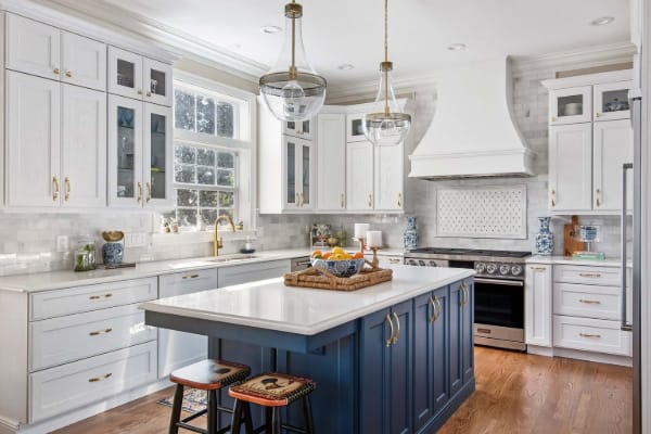Updated kitchen remodel in Cincinnati featuring new quartz countertops, tile backsplash, and modern cabinetry installed by Tranquil Kitchen & Bath.